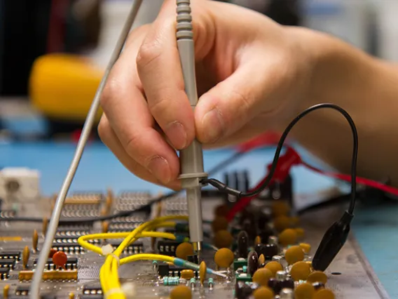 Testing electrical connections on a circuit board. 