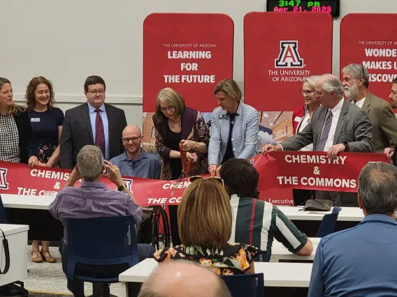 photo of the ribbon cutting ceremony during Chemistry and The Commons Open House