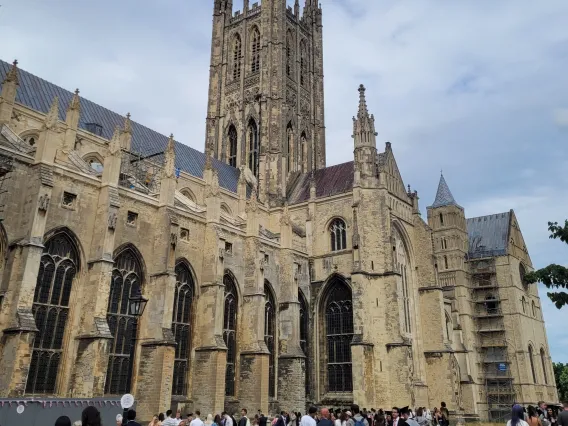 Photo of large castle with many people tourists grouped out front, taken by Ananya Chakraborti