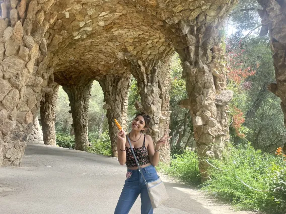 Grace Parekh under a stone structure