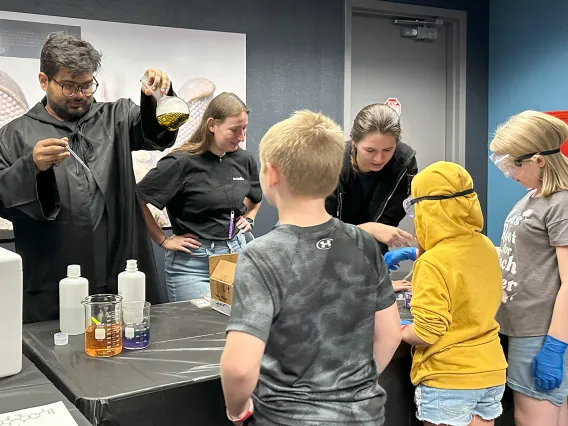 PAWS performs some "spooky" tricks for kids at Flandrau