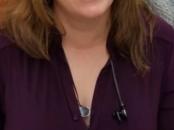 Jennifer Autz smiling in a lab