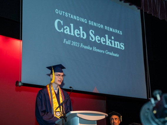 Caleb Seekins speaks during the W.A Franke Honors College Outstanding Senior award ceremony