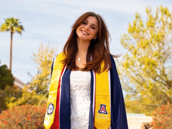 Angela Mankin wearding a graduation gown