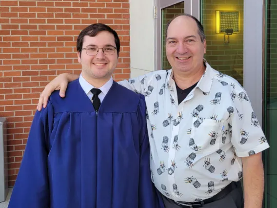 Daniel and Anthony Ventrone standing together smiling