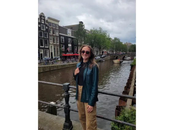 Erin Schuette smiling in front of a river and Denmark