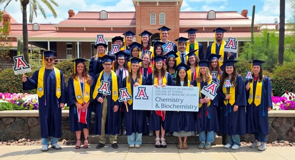 2025 Graduating students photo in front of Old Main