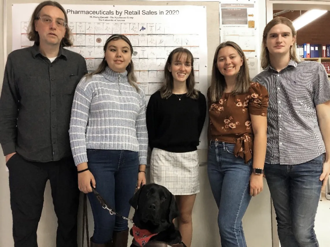 Picture (from left) Professor Njardarson, Evamaria, Jillian, Cassidy, and Palmer. Also shown is Evamaria’s trusted companion Chauncey.