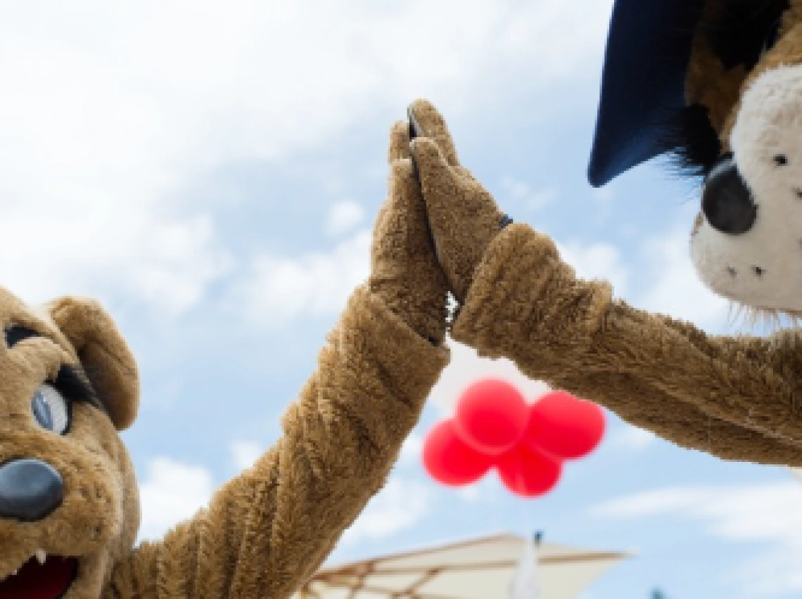 Wilbur and Wilma high five