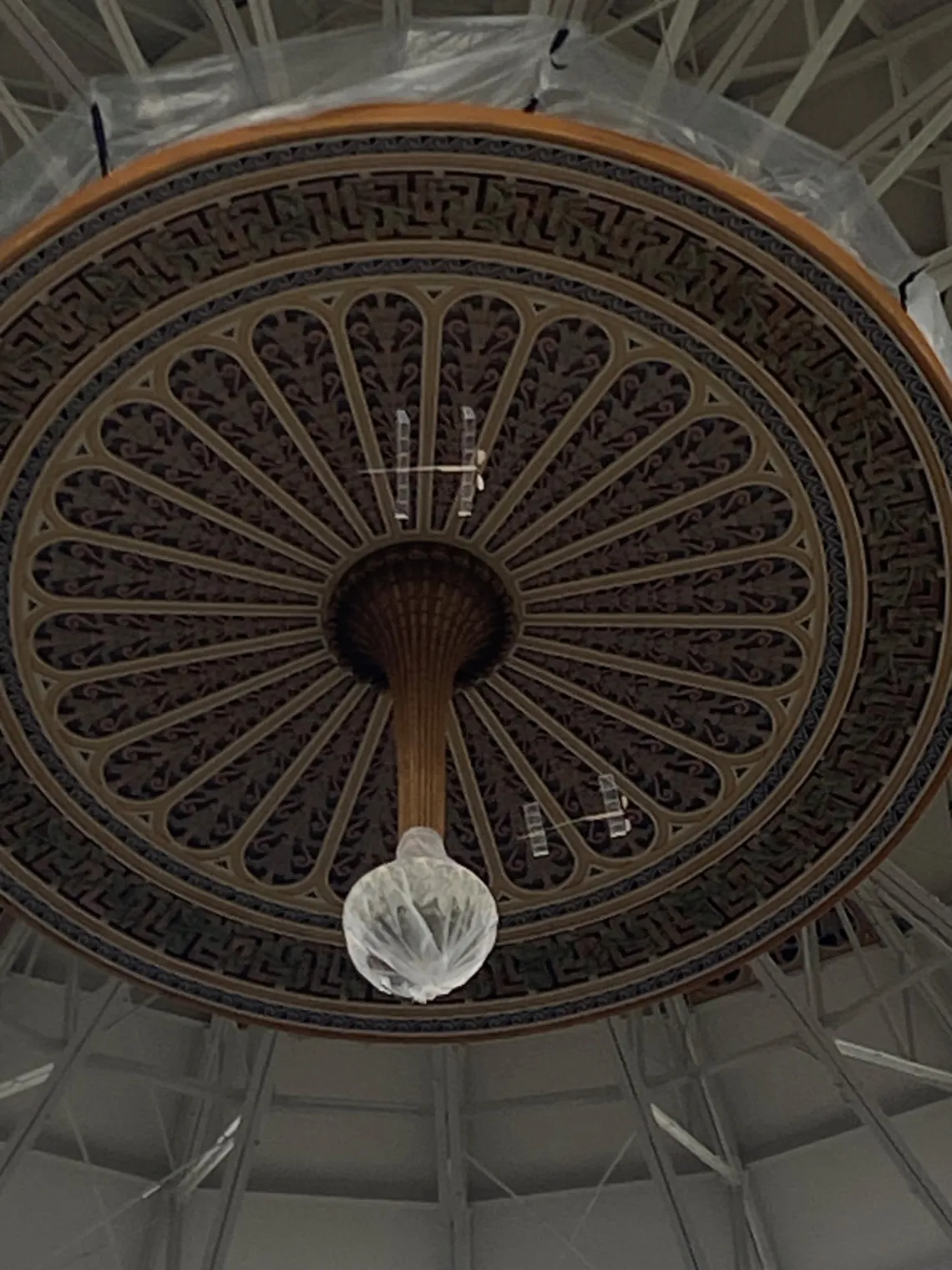 zoomed in photo of two planes flying near the ceiling of the West Baden Springs hotel in Indiana