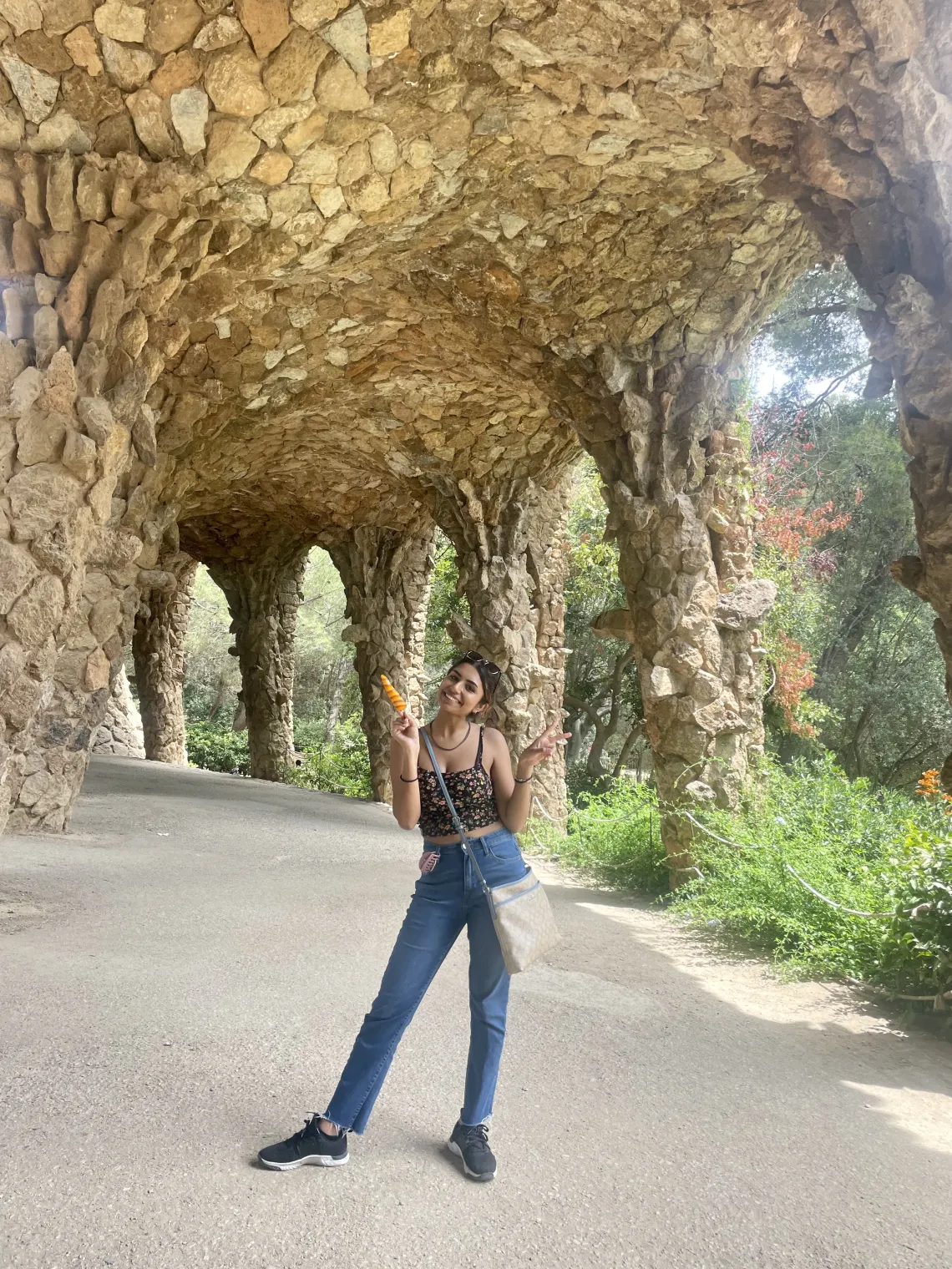 Grace Parekh under a stone structure