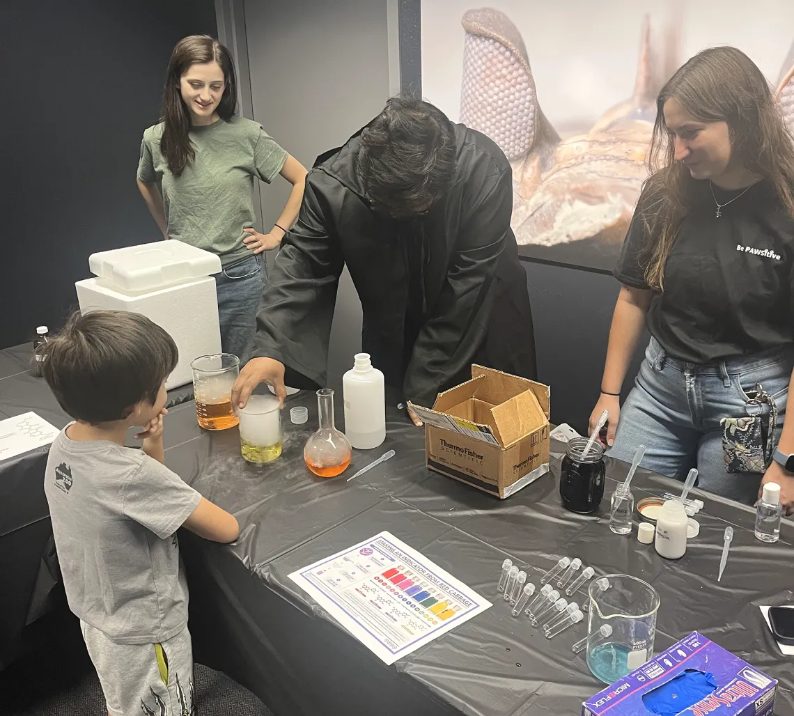 PAWS performs some "spooky" tricks for kids at Flandrau