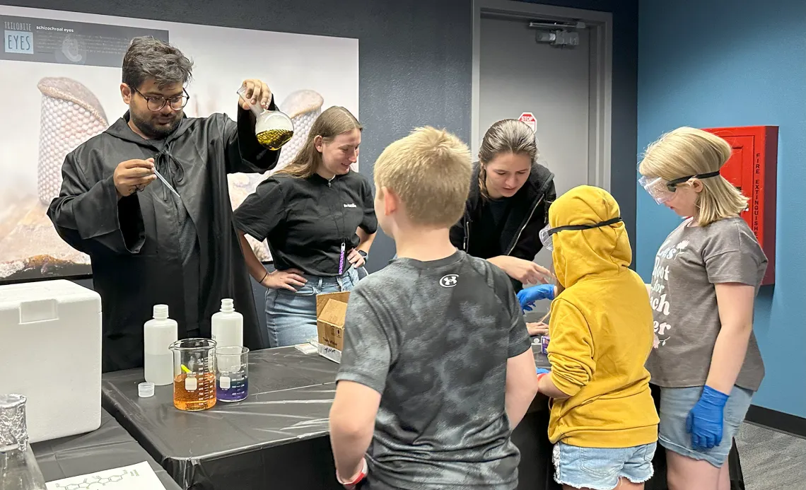 PAWS performs some "spooky" tricks for kids at Flandrau