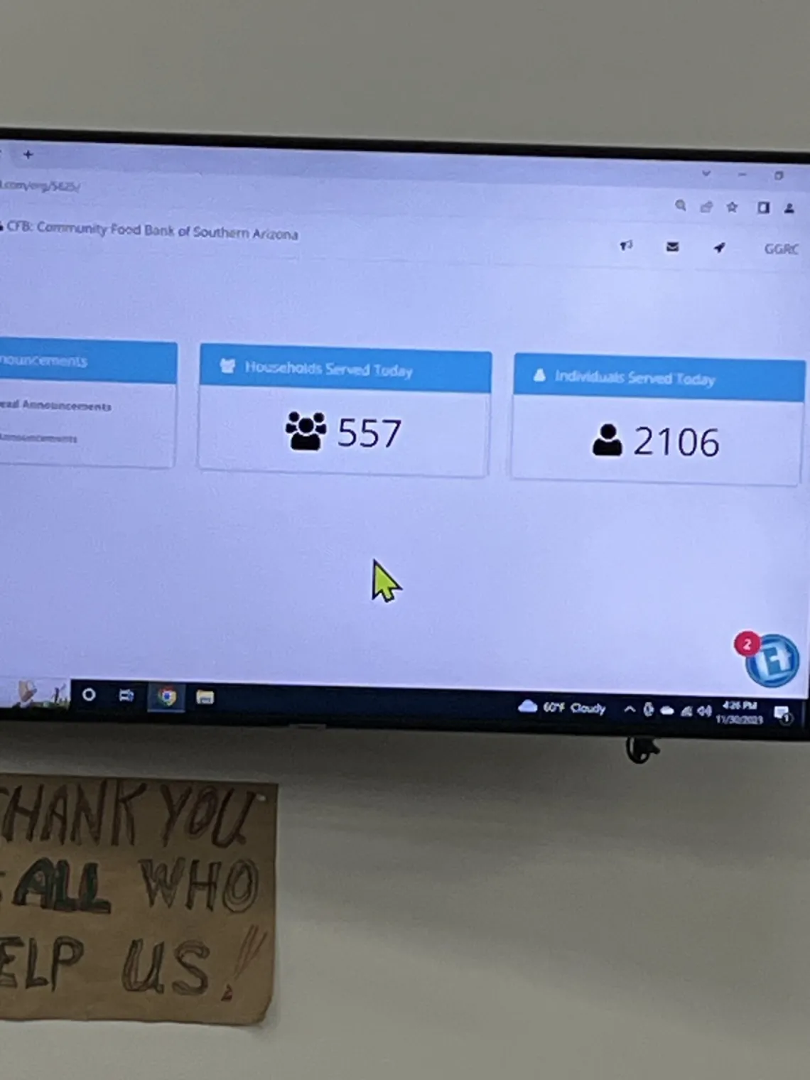 Monitor reads 557 households served today and 2106 individuals served at the Community Food Bank of Southern Arizona