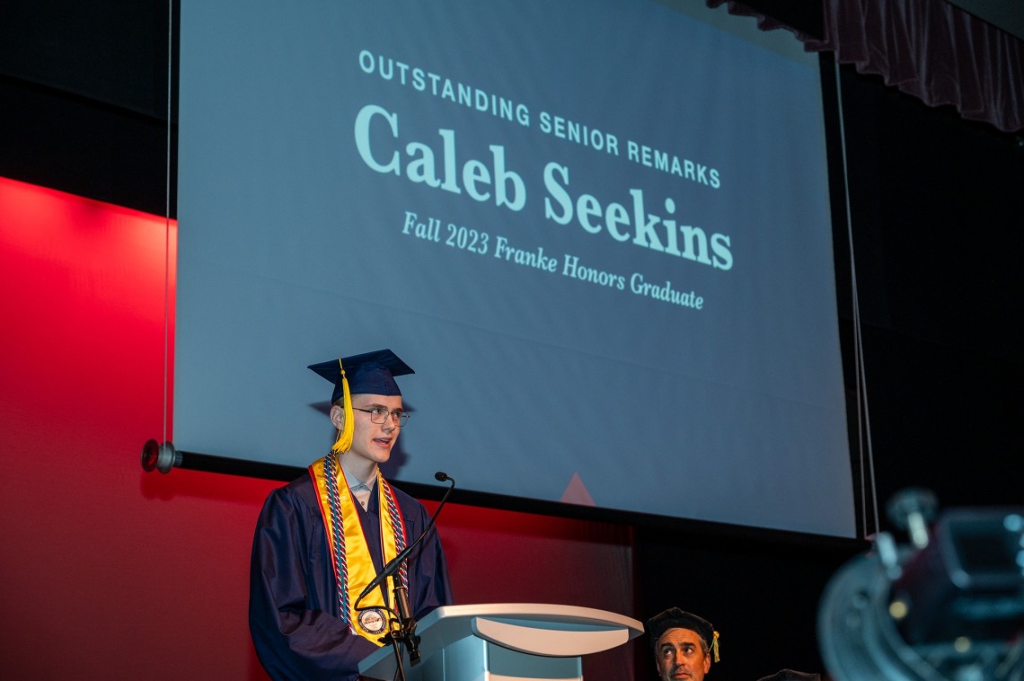 Caleb Seekins speaks during the W.A Franke Honors College Outstanding Senior award ceremony