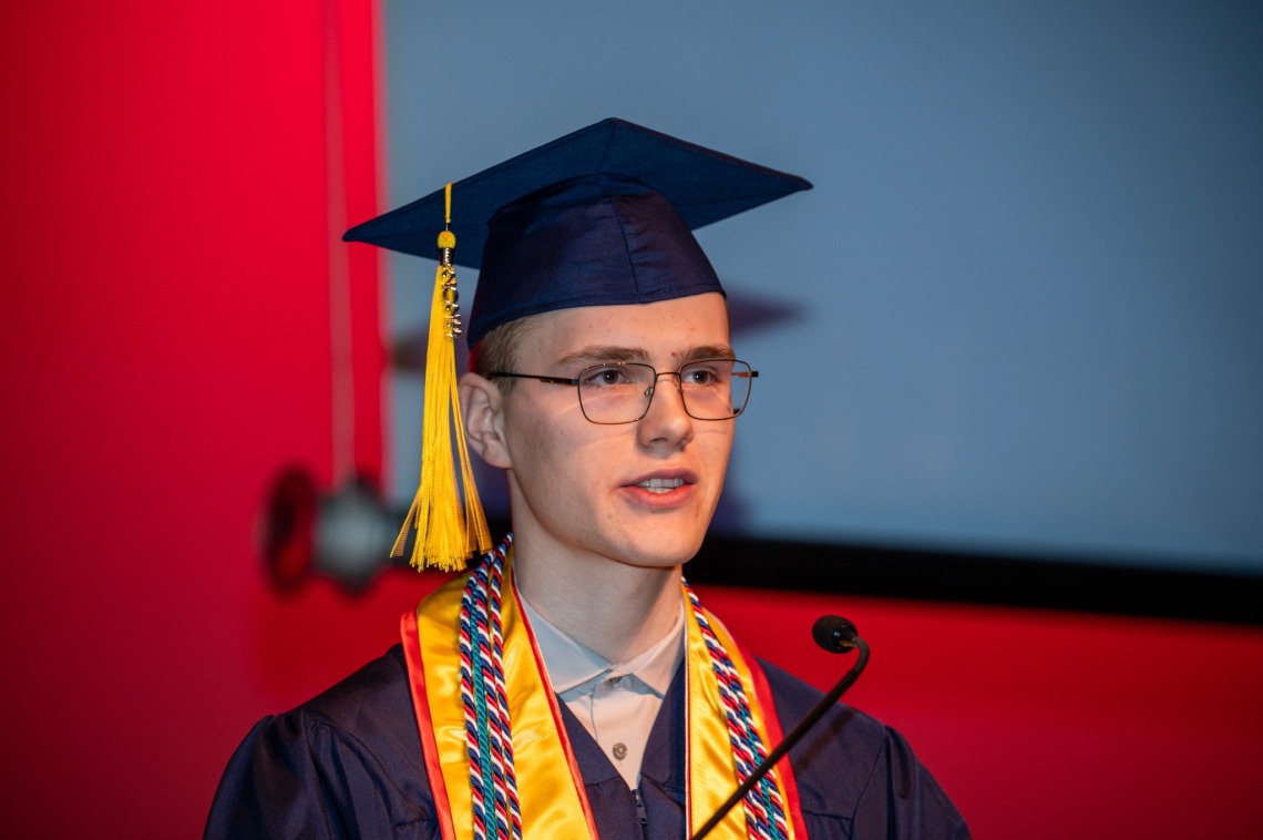 Facial closeup of Caleb Seekins while speaking during the W.A Franke Honors College Outstanding Senior award ceremony