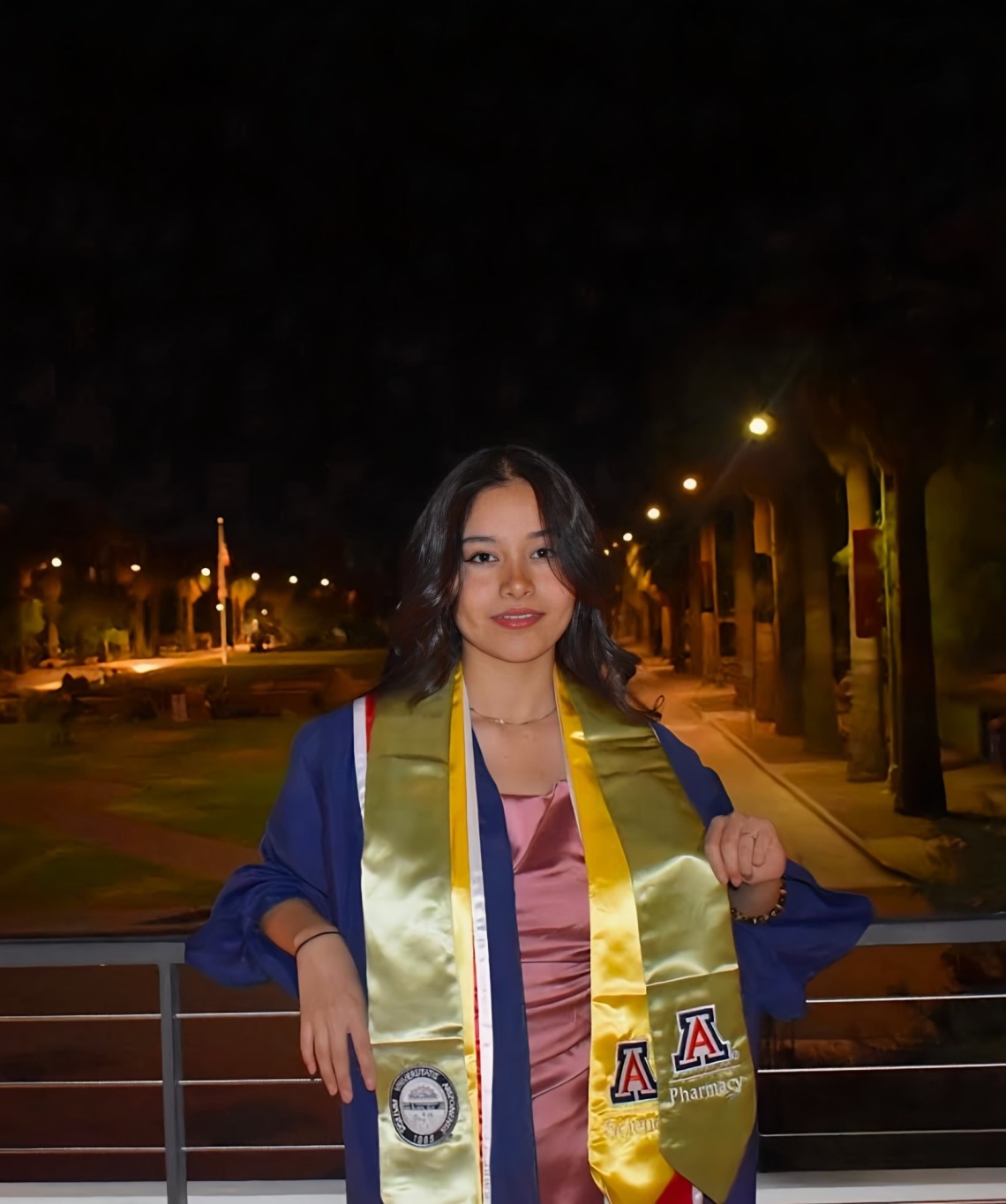 Photo Ale Carreon in graduation gown