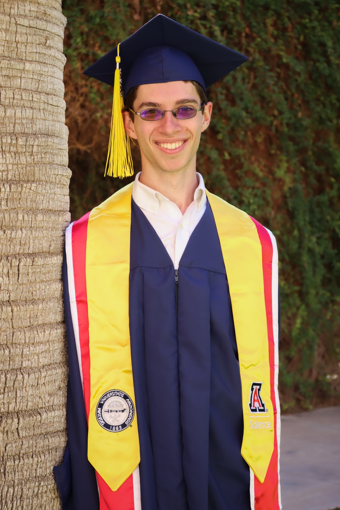 David Jurkowitz wearing a graduation cap and gown