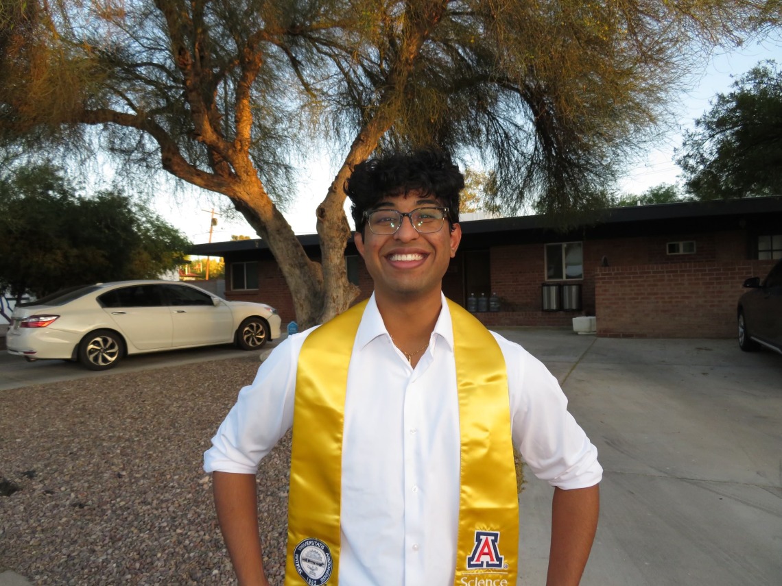 Sai Julakanti wearing a graduation sash