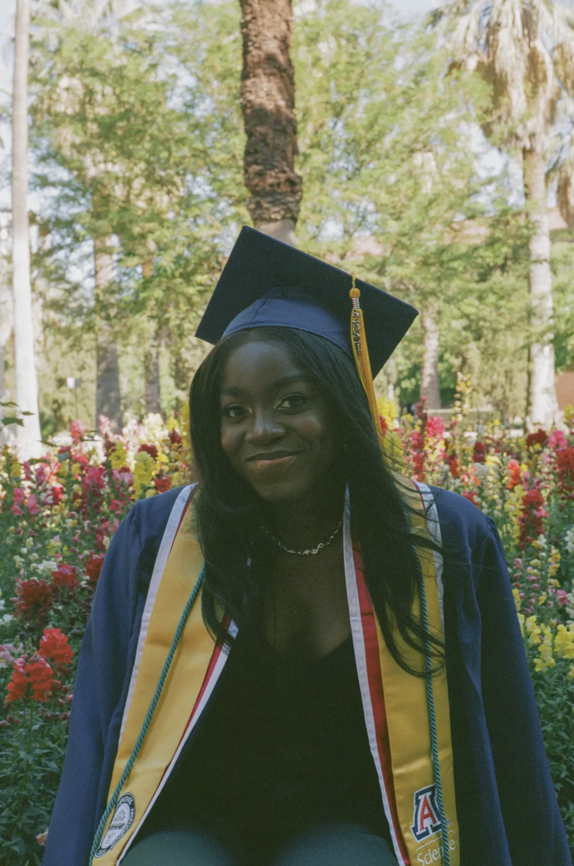 Veronica Hode wearing graduation cap and gown