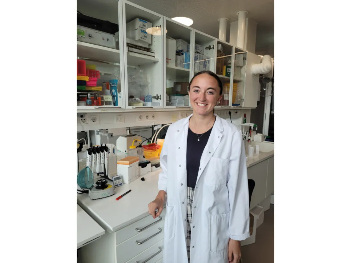 Erin Schuette smiling in a lab