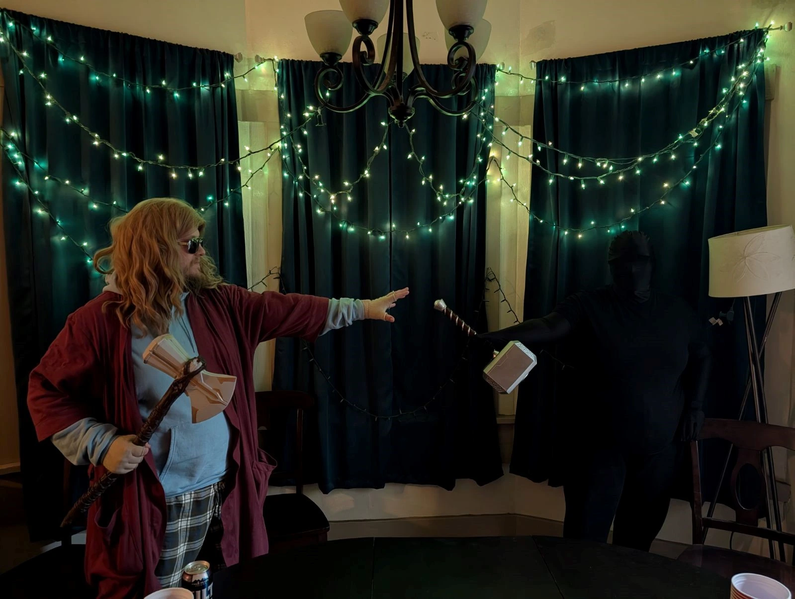 Lily North dressed as depressed Thor and hammer