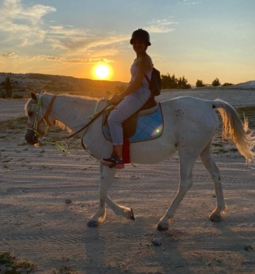 Gizem riding a horse