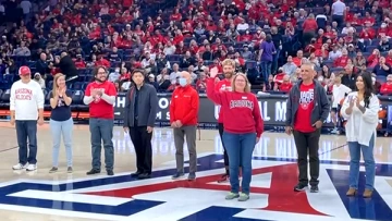 Dr. Amy Graham on court at halftime