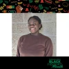 Photo of Abena Oduro-Gyaminah with Black History Month banner